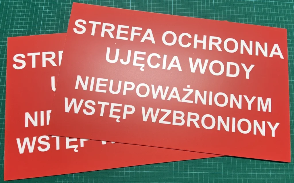 tablica reklamowa wydrukowana w Doble, strefa ochronna